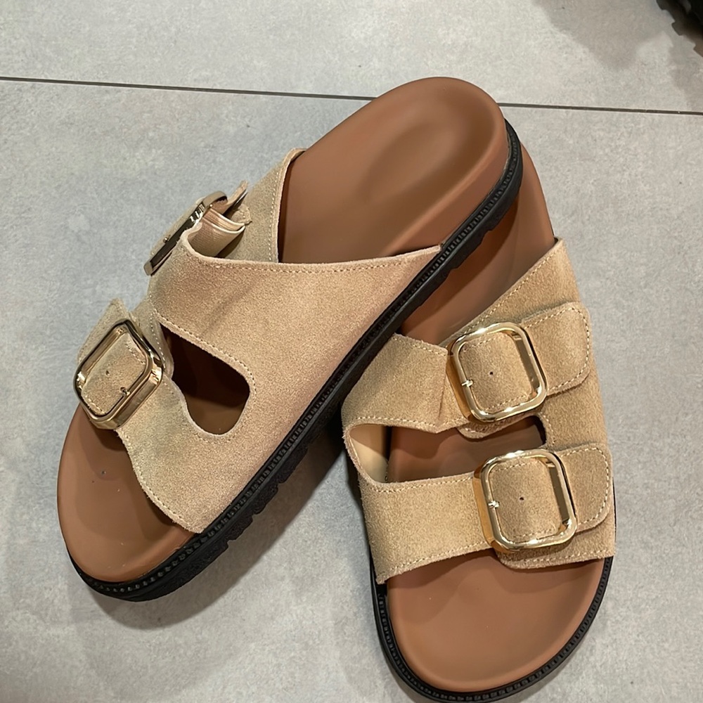 Tan buckle shoes